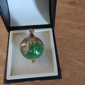 Gemstone globe gold pendant.   Your Purchase Supports Wildlife Rescue!